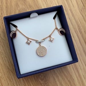 NIB Swarovski Crystal Moon Phase and Star necklace in rose gold